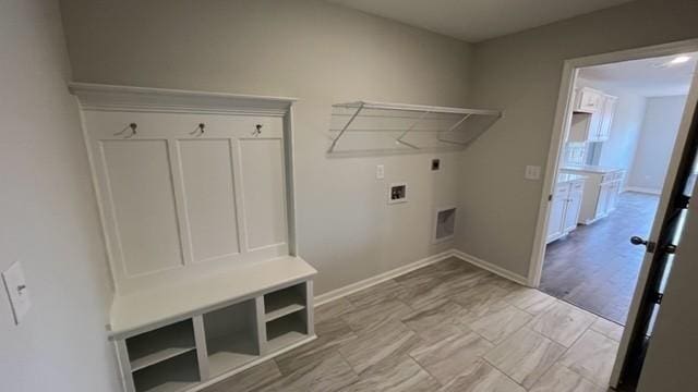 laundry room featuring washer hookup and electric dryer hookup