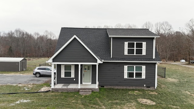 view of front facade with a porch and a front yard