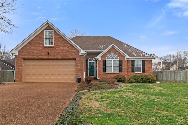 view of front of house with a front lawn and a garage