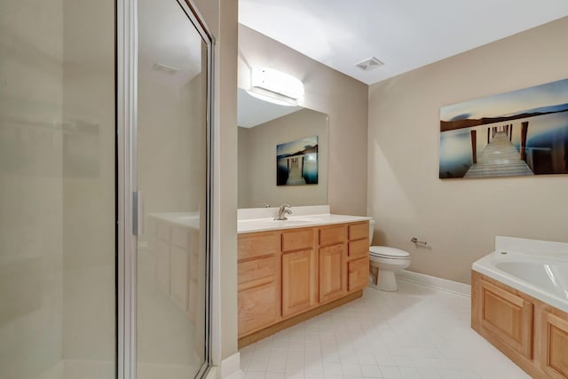 full bathroom featuring vanity, toilet, and shower with separate bathtub