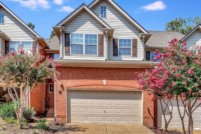 view of front of property featuring a garage