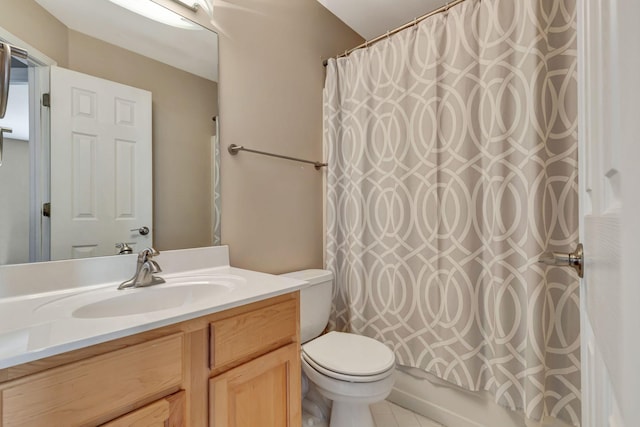 full bathroom featuring vanity, shower / bath combination with curtain, and toilet