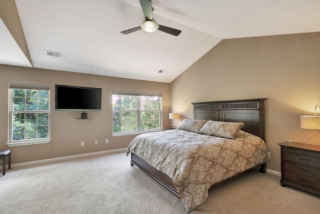 bedroom featuring light colored carpet, ceiling fan, and lofted ceiling