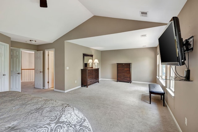 carpeted bedroom featuring vaulted ceiling and ceiling fan