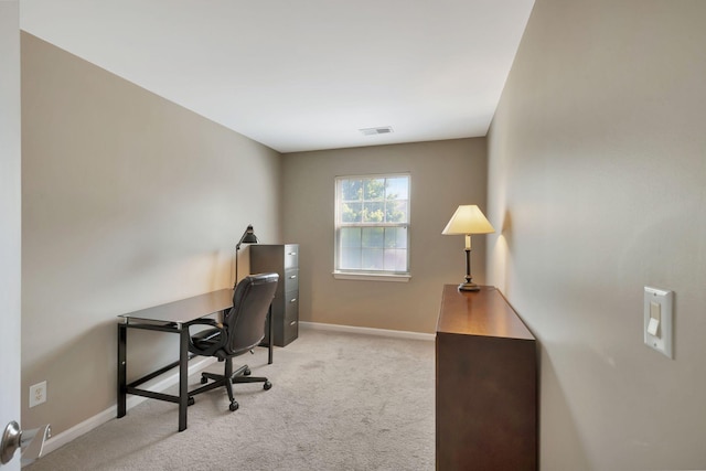 office space with light colored carpet