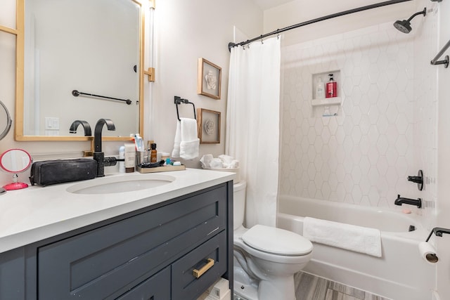 full bathroom with shower / bath combo, vanity, and toilet