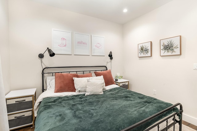 bedroom featuring hardwood / wood-style floors