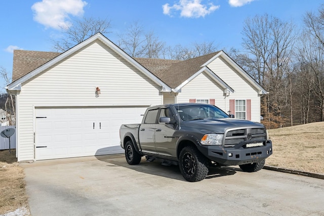 view of property exterior with a garage