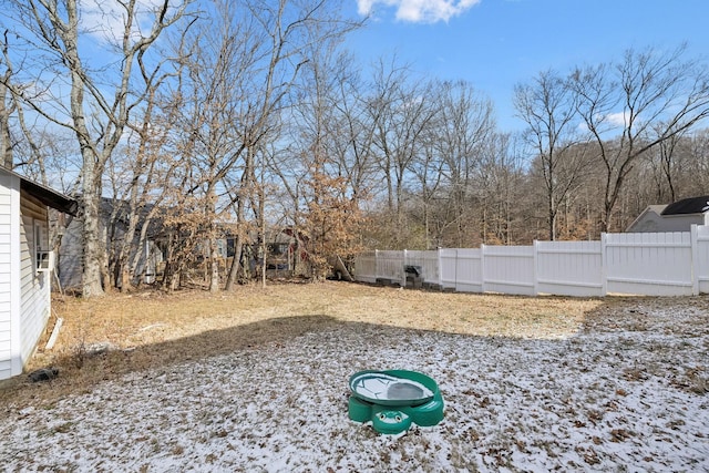 view of yard covered in snow