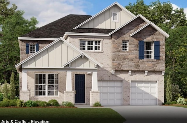 view of front of home featuring a garage and a front yard