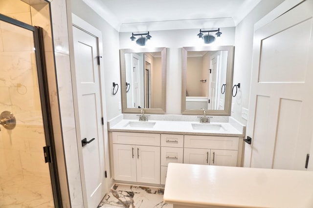 bathroom featuring vanity and an enclosed shower