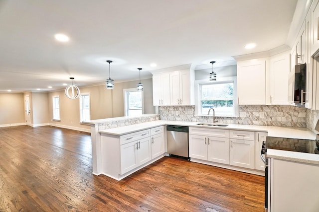 kitchen with sink, white cabinets, and stainless steel appliances