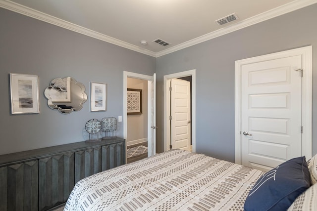 bedroom with crown molding