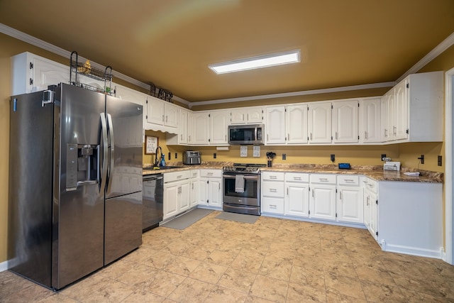 kitchen featuring white cabinets, sink, light stone countertops, and stainless steel appliances