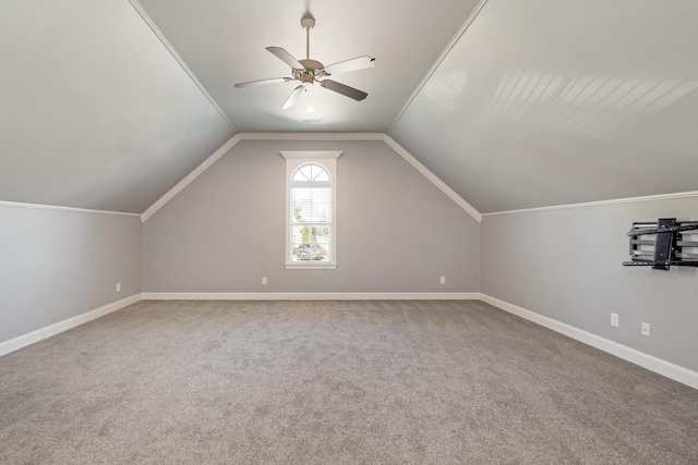 bonus room with ceiling fan, carpet, and lofted ceiling