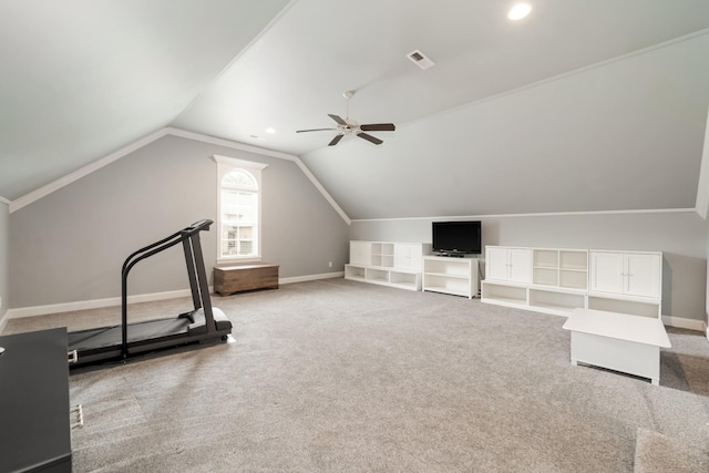 exercise room with carpet, vaulted ceiling, and ceiling fan