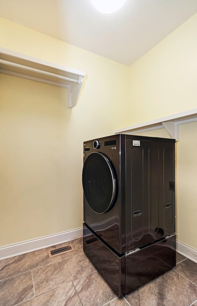 laundry area with washer / clothes dryer