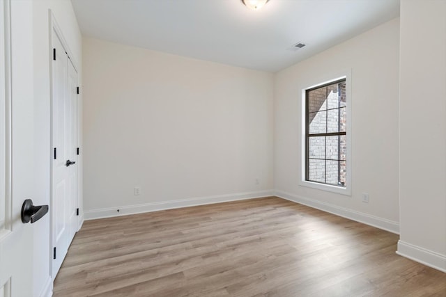 empty room featuring light hardwood / wood-style flooring