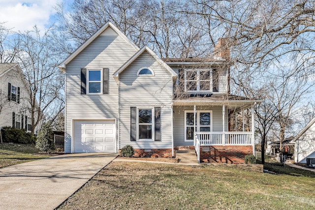 front of property with a porch, a garage, and a front lawn