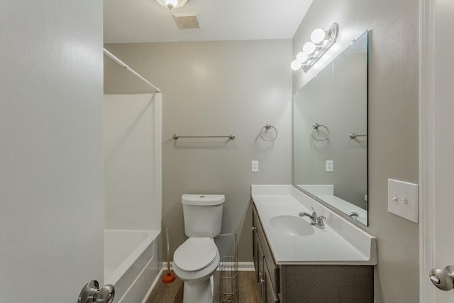 full bathroom with washtub / shower combination, wood-type flooring, vanity, and toilet