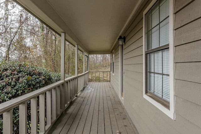 wooden deck featuring covered porch