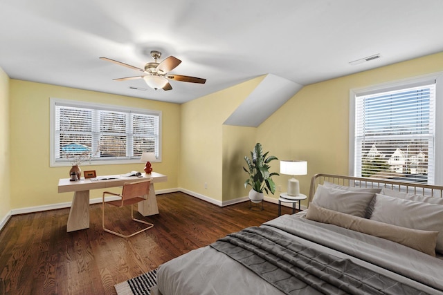 bedroom with ceiling fan and dark wood-type flooring