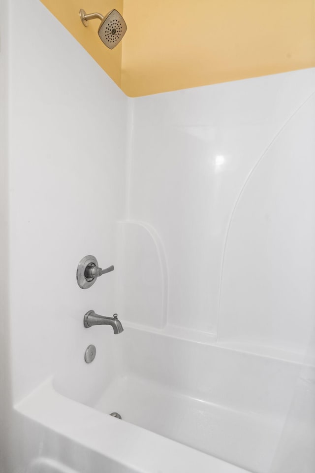 bathroom with shower / bathtub combination