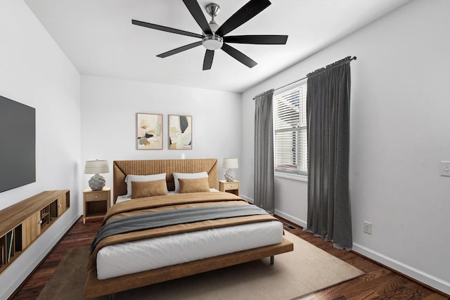 bedroom featuring dark hardwood / wood-style floors and ceiling fan