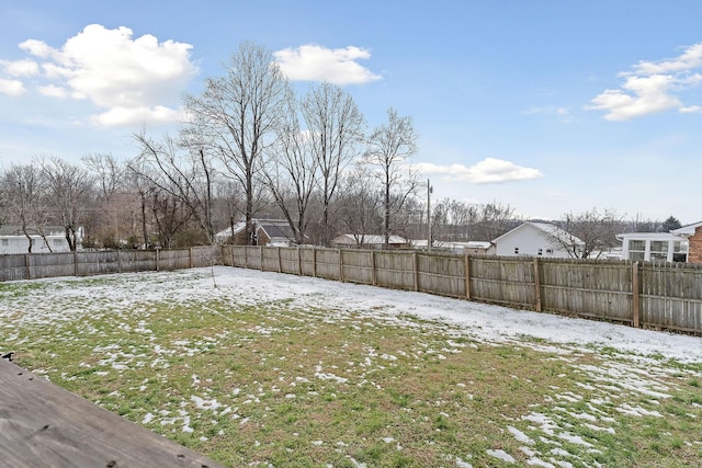 view of yard covered in snow