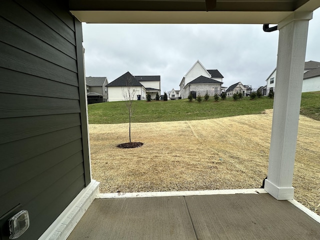 view of yard featuring a residential view