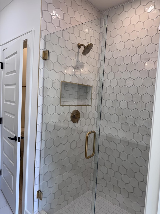 full bathroom with a shower stall