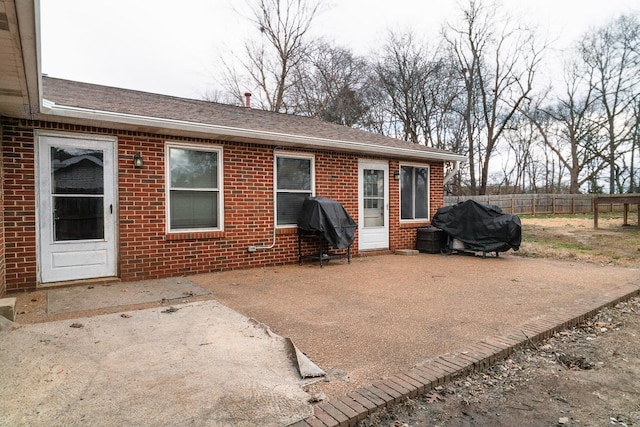 rear view of property with a patio area