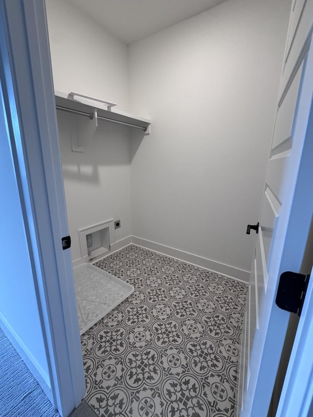 laundry room with washer hookup, tile patterned flooring, baseboards, hookup for an electric dryer, and laundry area