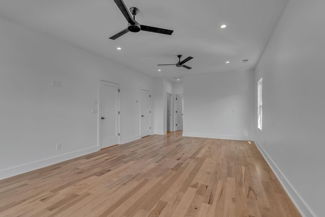 unfurnished room with light wood-style flooring, baseboards, a ceiling fan, and recessed lighting