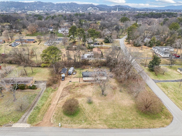 drone / aerial view featuring a mountain view