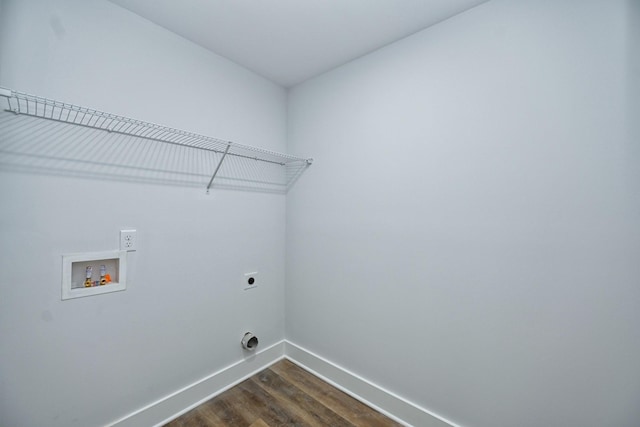 clothes washing area with hookup for an electric dryer, hookup for a washing machine, and dark hardwood / wood-style floors