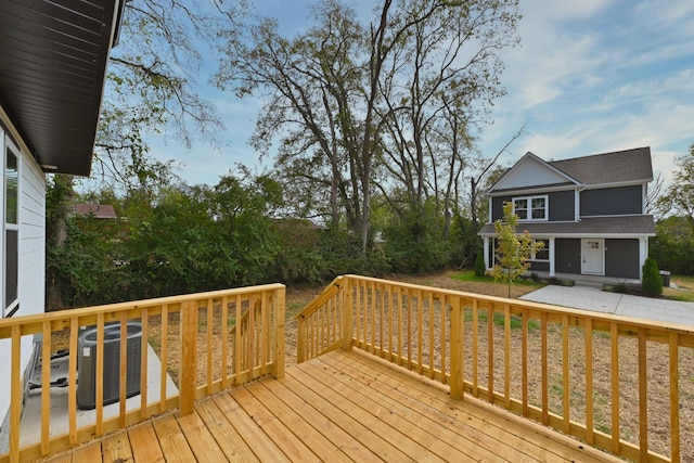 wooden terrace featuring central AC