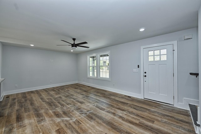 entrance foyer with dark hardwood / wood-style floors, ceiling fan, and a wealth of natural light