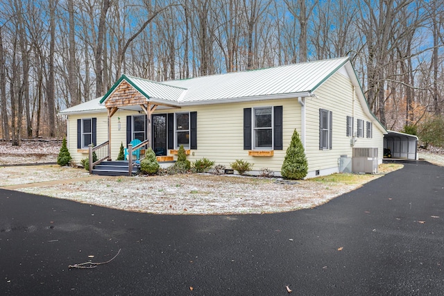 view of front of home with a carport