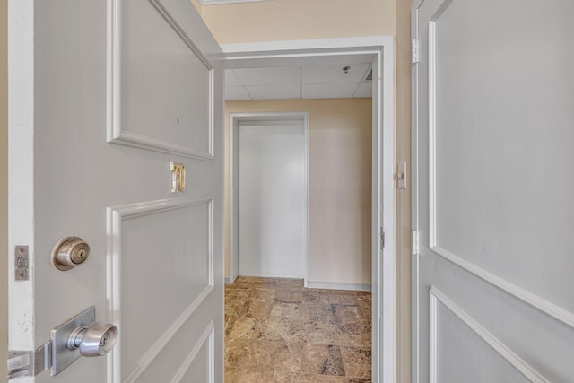 bathroom featuring a drop ceiling