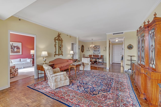 living room featuring a chandelier, parquet floors, and ornamental molding