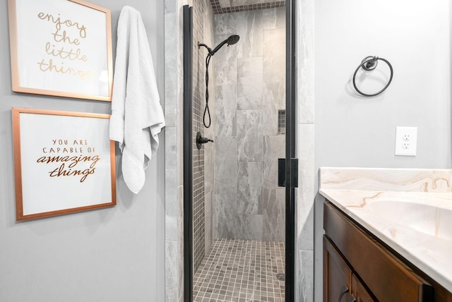 bathroom with vanity and walk in shower