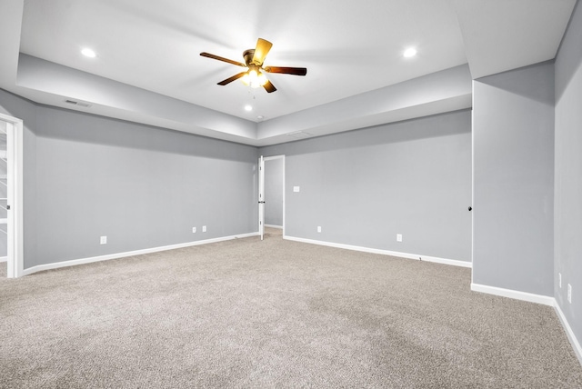 spare room with carpet flooring and ceiling fan