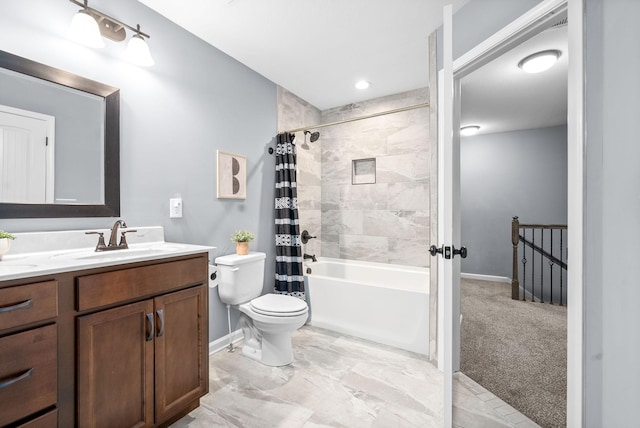 full bathroom with vanity, toilet, and shower / bath combo