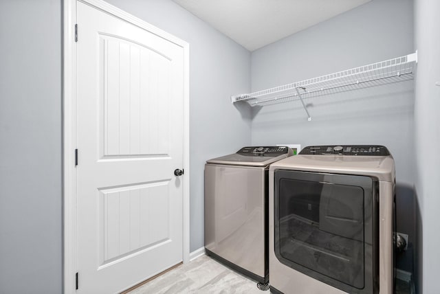 laundry room featuring washer and dryer