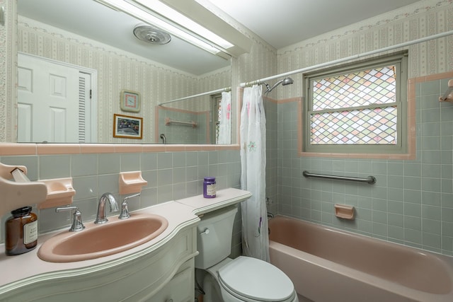 full bathroom with decorative backsplash, shower / bath combo with shower curtain, vanity, and toilet