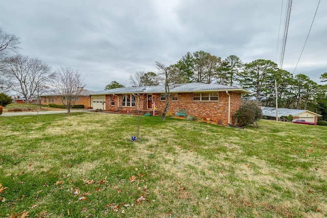 exterior space with a yard and a garage