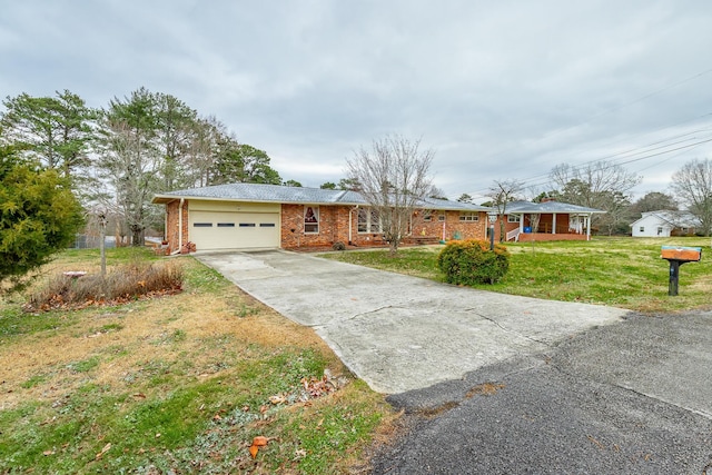 single story home with a front lawn and a garage