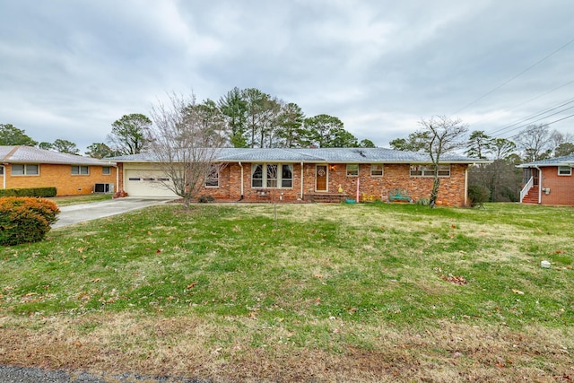 single story home featuring a front yard and a garage