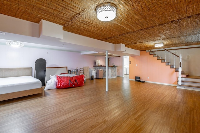 basement featuring wood-type flooring